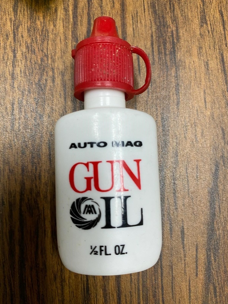 Auto Mag Gun Oil (.5 Oz) (Sample Size Bottle). Includes Dropper for precise application of the Auto Mag oil.